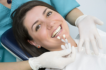 woman at dentist getting teeth whitening Skokie, IL